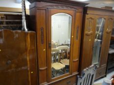 A quantity of vintage bedroom furniture including three wardrobes, two mirrored dressing tables
