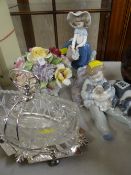 A Lladro figure of a boy cuddling puppies with an older dog, a Lladro figure of girls with baskets