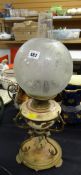 A brass & pottery antique oil lamp Condition Report: please request* *Condition is not stated in