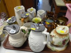 A good collection of jugs including three good copper lustre examples and relief decorated Parian