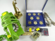 A retro reproduction telephone, sundry cigarette lighters ETC Condition Report: please request* *