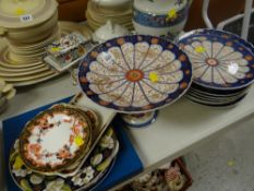 An Imari pottery tazza with matching plates, a Royal Crown Derby plate, sundry sandwich plates &