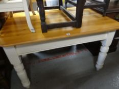 A vintage pine top farmhouse table with painted base Condition Report: please request* *Condition is
