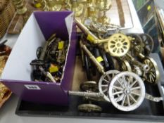 A quantity of cannon ornaments on a tray Condition Report: please request* *Condition is not