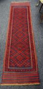 A blue & red ground Meshwani runner, 240 x 65cms Condition Report: please request* *Condition is not