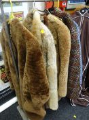 A vintage fur coat, two other fur-type coats & two Welsh woollen jackets Condition Report: please