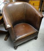 A vintage studded brown leather tub chair Condition Report: please request* *Condition is not stated