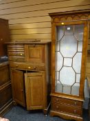 Reproduction mahogany finish astragal glazed display cabinet having two-drawer base Condition