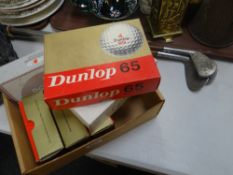 Three vintage golf clubs & a parcel of boxed golf balls Condition Report: please request* *Condition