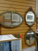 A vintage oval brass framed mirror & a pair of gilt framed mirrors Condition Report: please request*