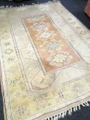A large Turkish Melas geometric patterned woollen rug, 9