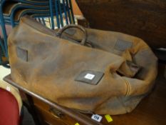 A vintage leather holdall Condition Report: please request* *Condition is not stated in this type of