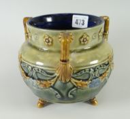 A Doulton Lambeth planter with three-handles & three feet, typically decorated with swags &