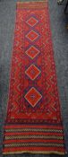 A red & blue ground patterned Meshwani runner, 247 x 59cms Condition Report: please request* *