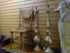 A pair of yellow metal Islamic-style table lamps & a modern carved kitchen chair Condition Report:
