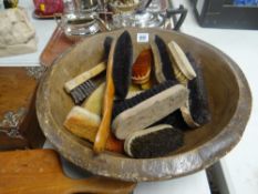 An antique farmhouse treen bowl & a collection of shoe polishing brushes Condition Report: please