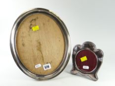 Large silver oval photograph frame together with another similar smaller, London & Birmingham