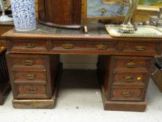 A vintage desk of nine drawers with leather top (for restoration) Condition Report: please