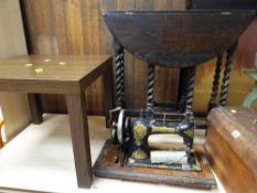 A vintage Jones cased sewing machine & a barley twist gate leg table ETC Condition Report: please