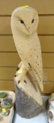 A wooden carved owl Condition Report: please request* *Condition is not stated in this type of