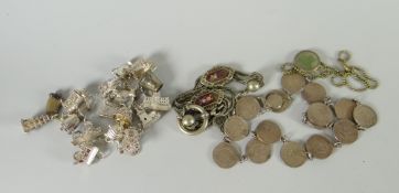 A parcel of silver charms & chains Condition Report: please request* *Condition is not stated in