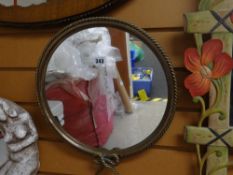 A vintage metallic rope-twist circular mirror Condition Report: please request* *Condition is not