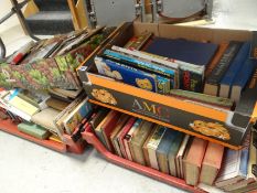 Four crates of various books, hardback & paperback, children's annuals, reference & tourist