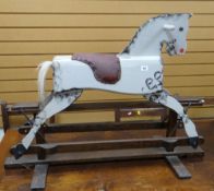 A vintage child's wooden & painted rocking horse Condition Report: please request* *Condition is not