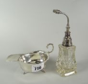 A silver sauce boat & silver mounted cut glass parfumiere Condition Report: please request via