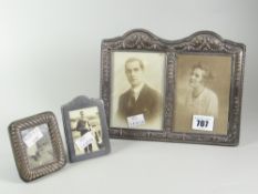 A good antique silver 'husband & wife' twin-portrait frame with easel support & two further