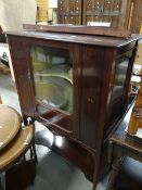 An Edwardian inlaid mahogany mirror-back music cabinet Condition Report: please request via email.
