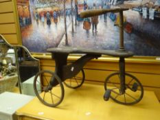 A naive vintage wooden & metal child's tricycle Condition Report: please request via email.