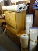 A mid-century light wood dressing table & matching chest together with five rolls of modern