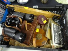 A vintage parcel of cased binoculars, tape measures, long folding Rabone Chesterman ruler ETC