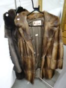 Two vintage fur coats
