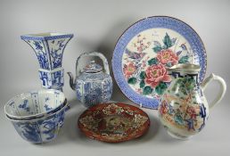 An interesting parcel of Oriental porcelain including square based trumpet vase with erotic base