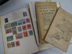 A Royal Mail vintage stamp album with approximately 20% completion, a vintage Ordnance Survey map of