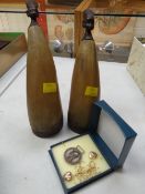 A pair of horn & wood African figures together with an Italian commemorative medal Condition Report: