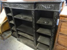 An ebonized carved antique breakfront bookcase, 152wx35dx121h cms. Condition Report: please