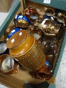 A quantity of copper lustre, jugs & a Hornsea provision jar Condition Report: please request via
