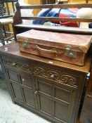 A mid-century carved dresser with plate rack & vintage suitcase Condition Report: please request via