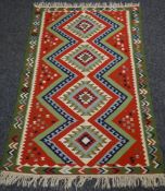 A Turkish Kilim rug, 148 x 100cms