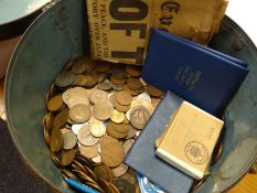 A vintage tin hat box with name plate for J Treharne containing a mass of old coinage