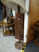 A vintage Chinese bamboo effect carved standard lamp & shade