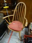 A hoop back Ercol kitchen chair Condition Report: please request via email. Condition reports not