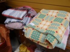 Parcel of blankets to include Welsh tapestry blankets, checked blanket, floral ETC