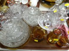 A quantity of mixed glassware including two decanters, a cranberry glass footed bowl ETC Condition