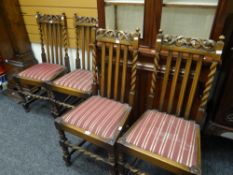 A set of four vintage carved & barley-twist dining chairs with drop-in-seats Condition Report: