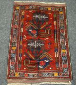 An Old Baluchi rug, 193 x 60cms