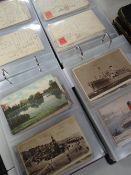 Two albums of neatly presented vintage postcards, one album mainly being British topographical